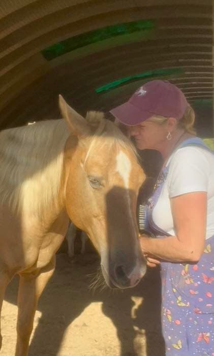 Grace and Lynn at BellaSoul Farm in Tellico Plains, Tennessee. Grace has been one of Lynn's greatest teachers on her recovery journey, inspiring the creation of Root & Rein, where horses help people reconnect with themselves through equine-assisted learning.